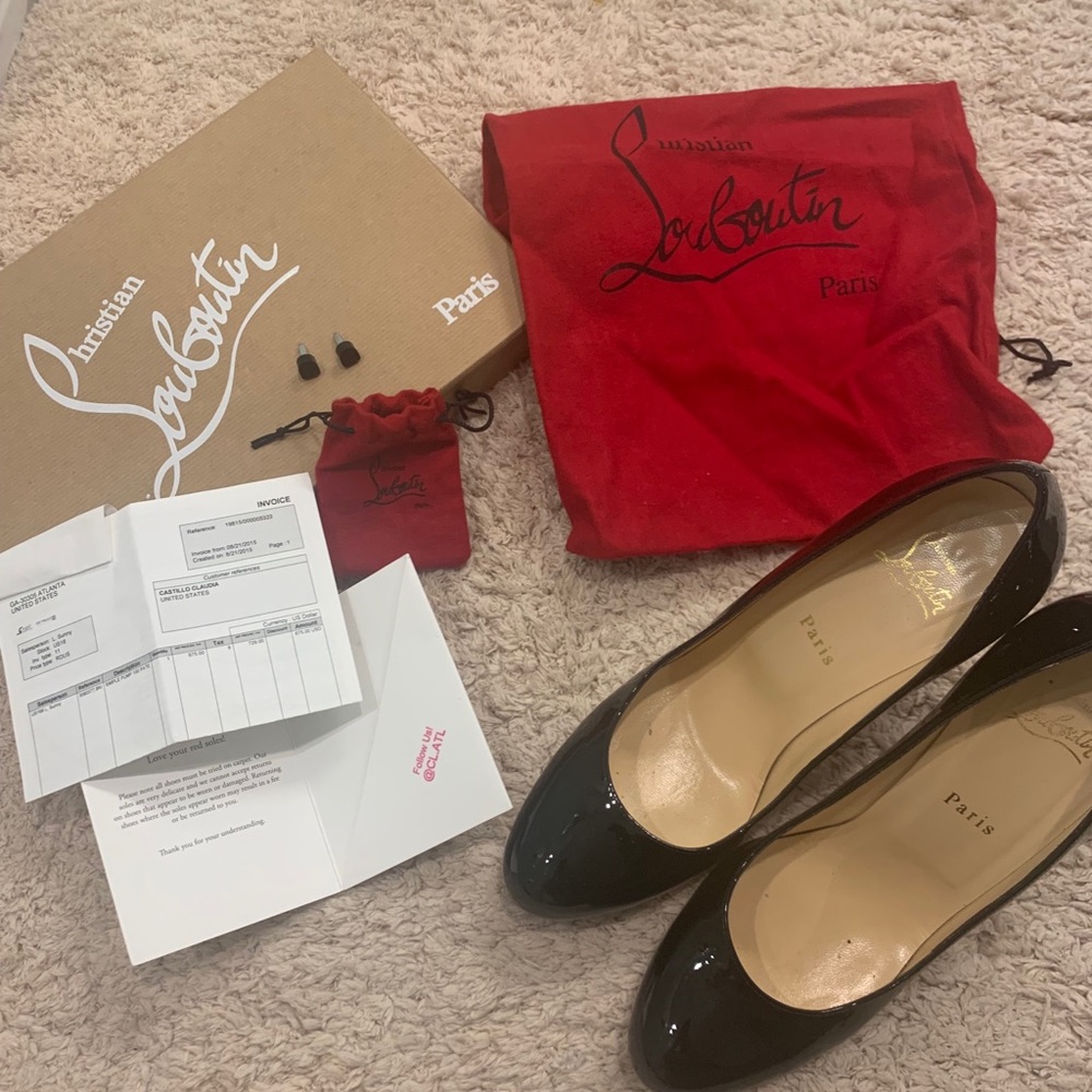 SOLD. Christian Louboutin black patent pumps